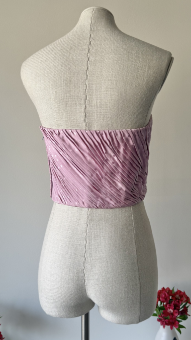 back view of vintage emanuel ungaro pink pleated corset top with fitted silhouette