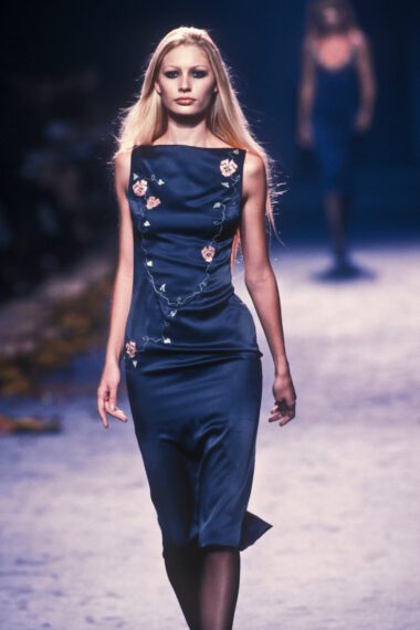 Fashion model on the runway of Chloé Fall Winter 1998 by Stella McCartney ready-to-wear collection, photographed by Guy Marineau, wearing a blue silk dress with floral embroideries
