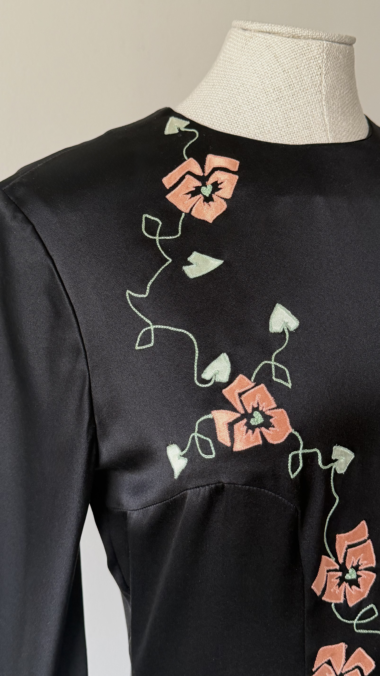 Close-up of floral embroidery on the front of Chloé Stella McCartney dress