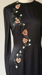 Front detail of Chloé black silk dress with floral embroidery